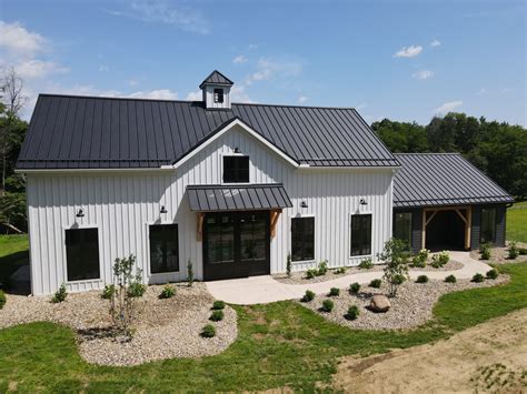 board and batten house with metal roof|board and batten metal roof.